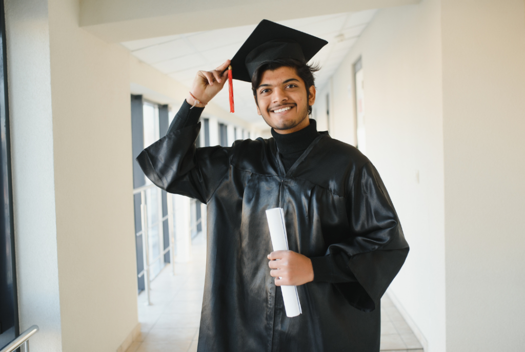 A student who has graduated happy with his education that was helped by the US investment visa
