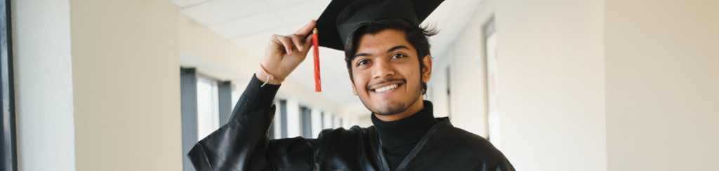 A student happy with his education helped by the US investment visa