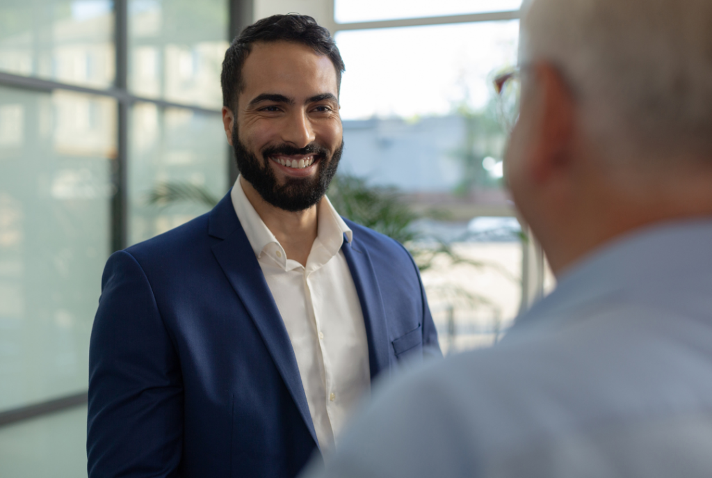 A man happy to be gaining the benefits from the i-526 application