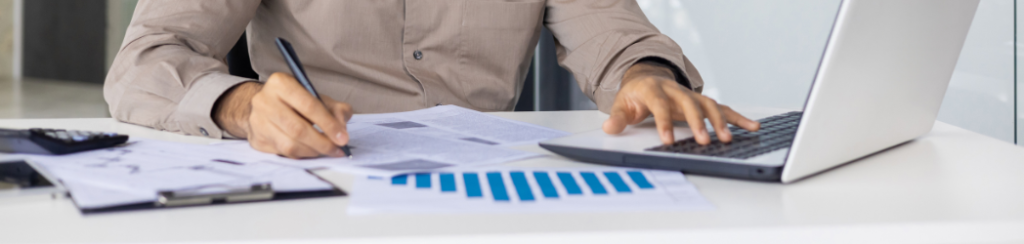 A potential investor with papers detailing the eb5 visa requirements