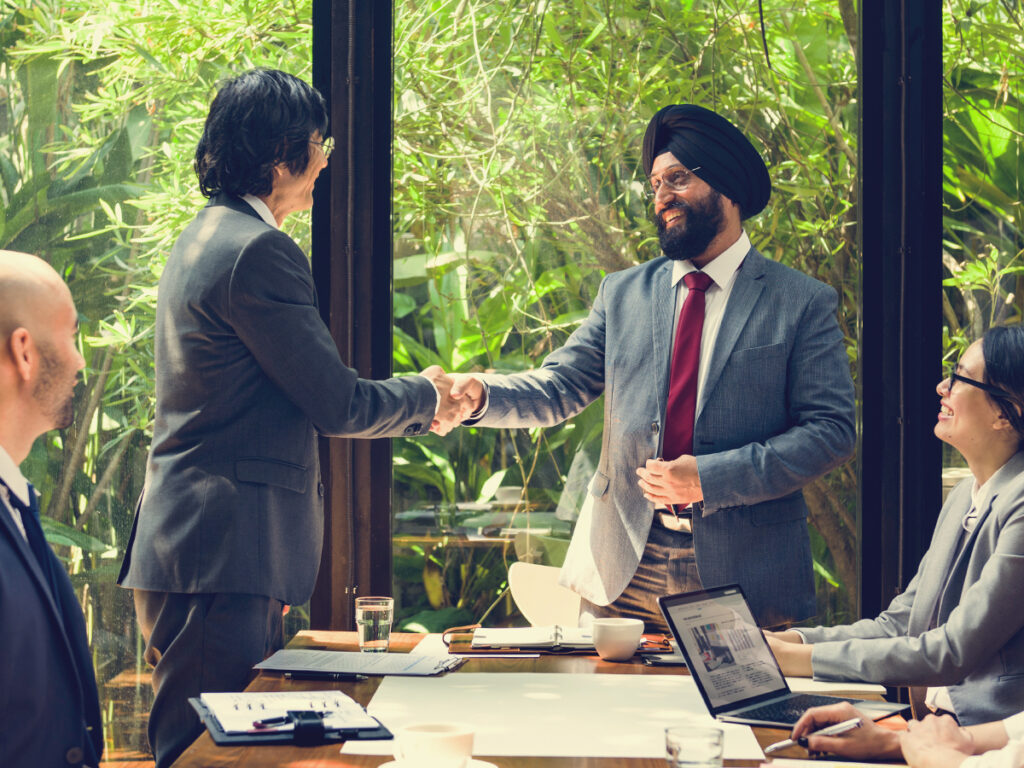 foreign investor discussing eb-5 investment projects in a meeting