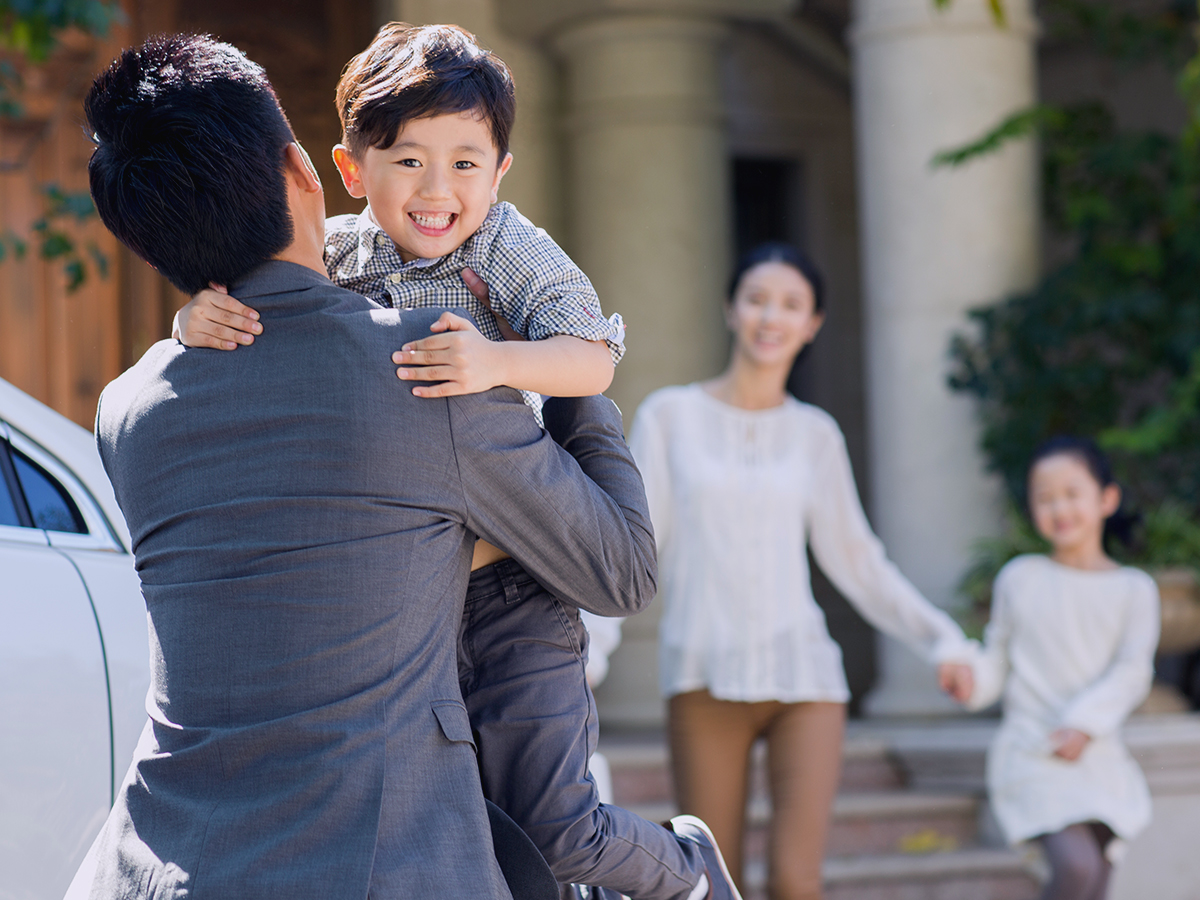 An eb5 investor with his happy family