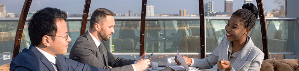 Discussing the selection of the right eb5 regional center with a foreign investor in a meeting