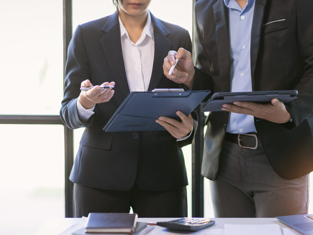 Co-workers discussing about eb5 status delays.